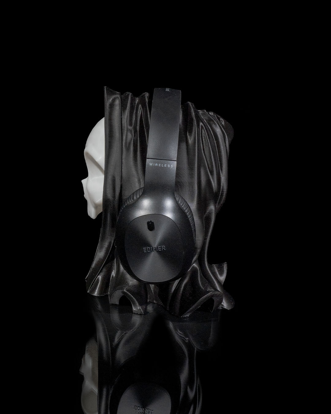 Side view of Skull Headphone Holder with cloak-like design for desk or gaming setup.