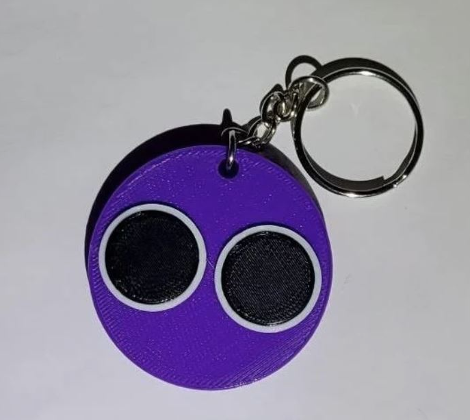 Contrive3D 3D Printed Rainbow Friends Keychains from the Roblox Monster Game. Lubbock, Texas. Purple