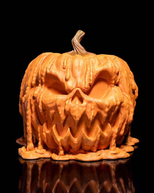 Halloween candy bowl shaped like a melting pumpkin, 3D printed in West Texas.