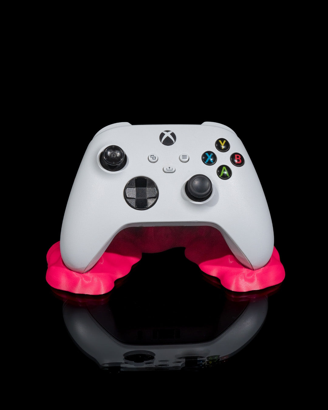 Xbox controller displayed on neon slime-style Sticky Match Controller Holder