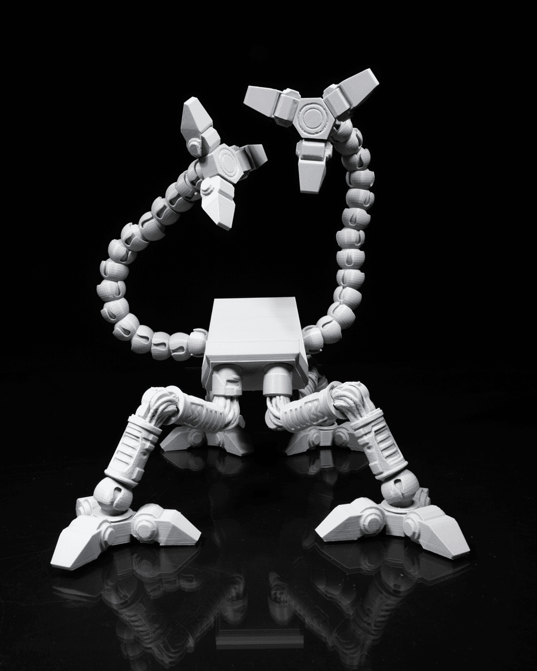 Gray articulated controller holder, empty, with robotic arms raised. 