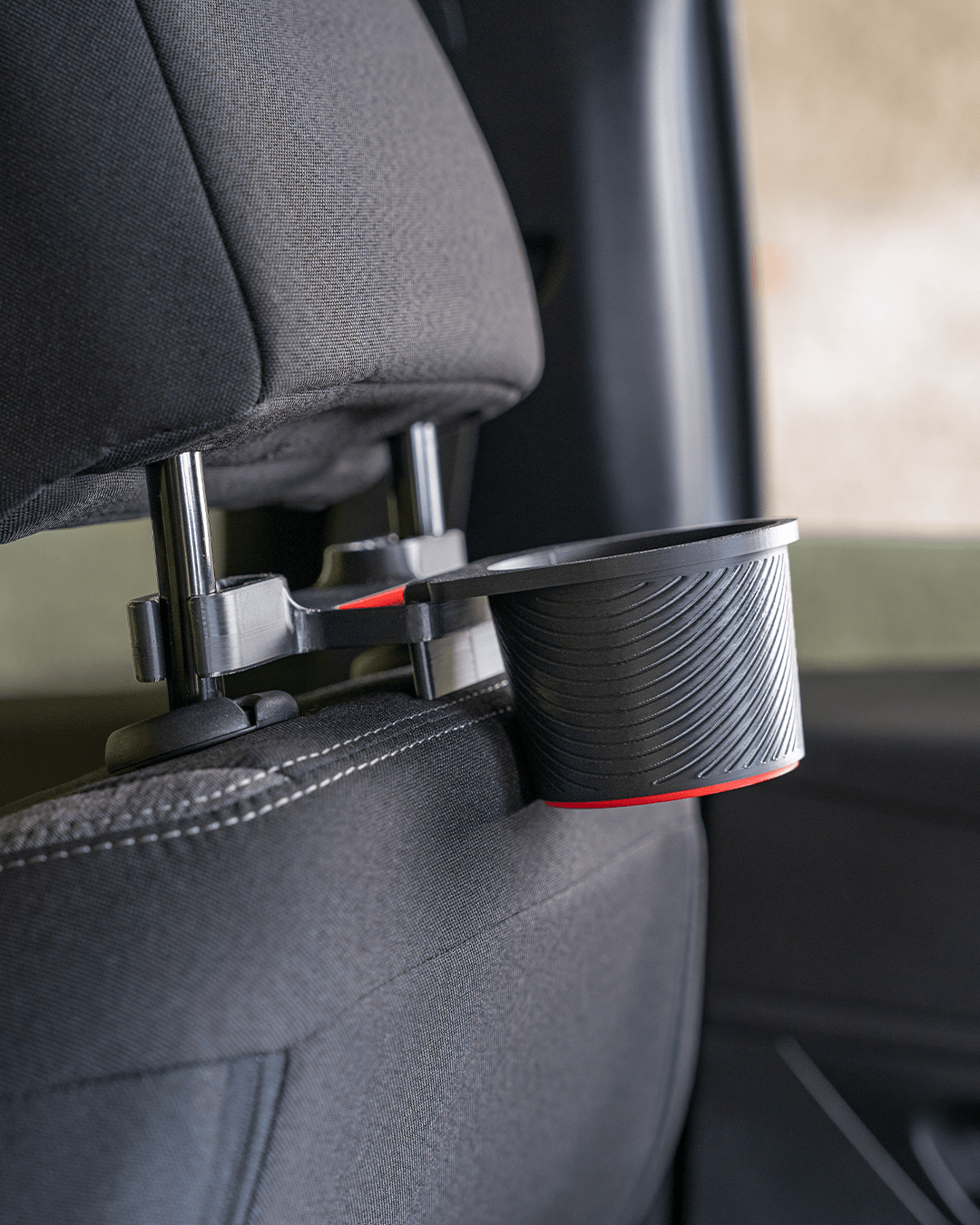 AutoEase Basic Passenger Kit installed with single cup holder behind front seat