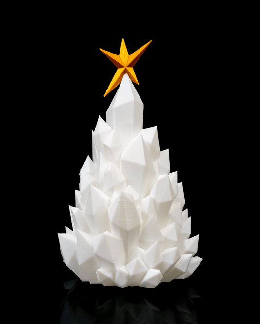 Front view of 3D printed Cryst-mas Tree showing faceted geometric design and gold star detail.