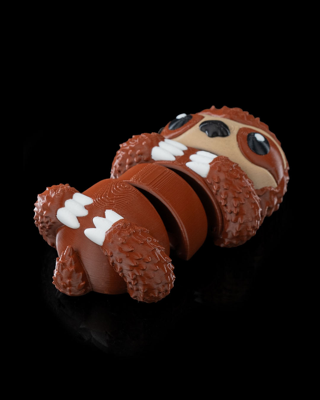 3D printed Cute Flexi Sloth toy front view showing articulated design and detailed facial features.