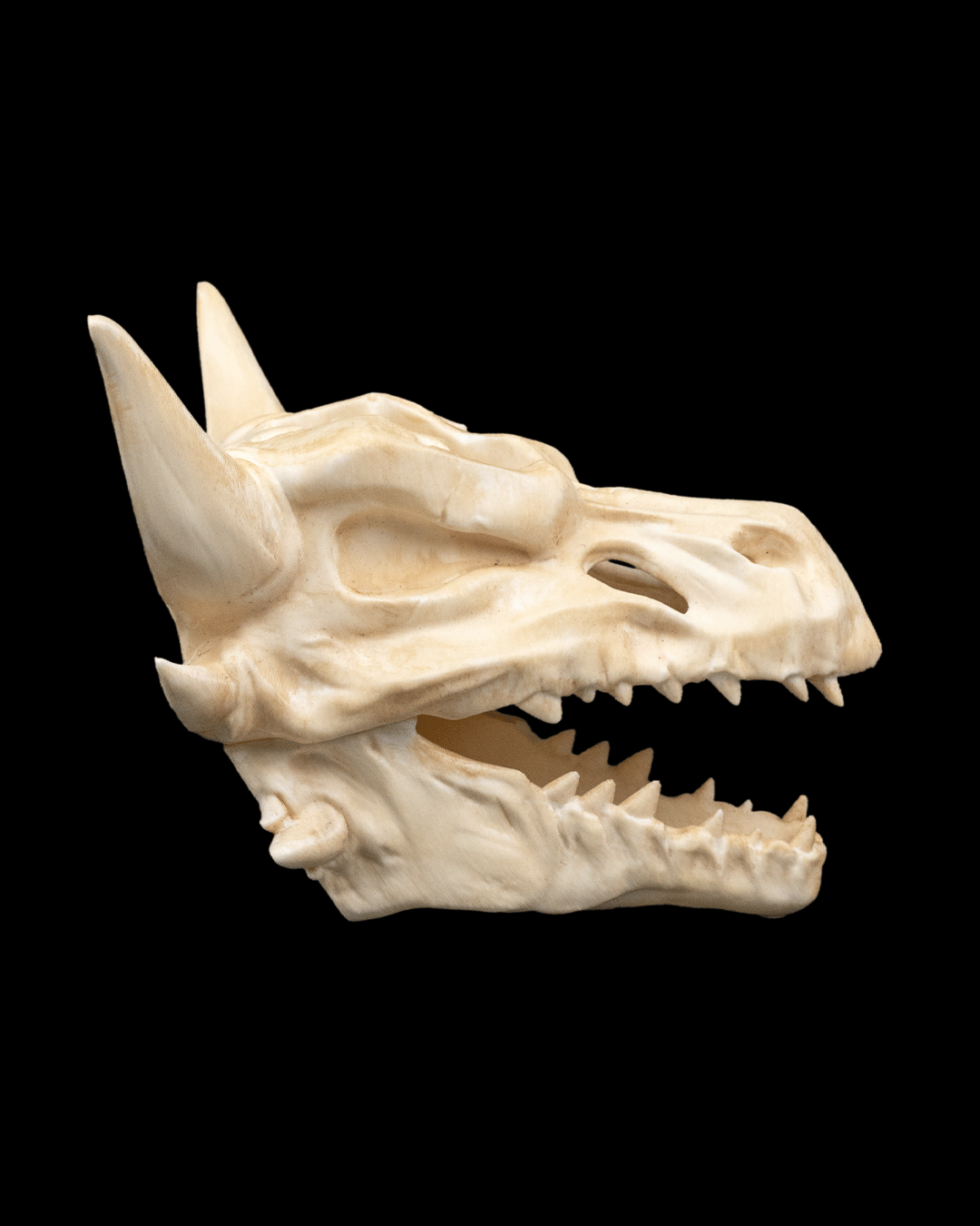 Side profile of Drip & Decay skull planter showing detailed dripping decay texture and horns.