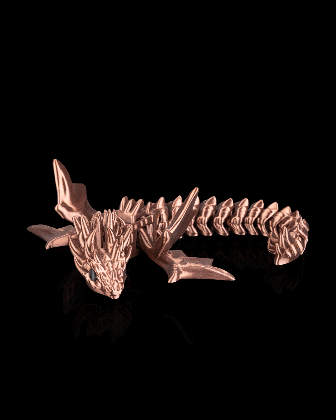 Front view of 3D printed Flexi Amphiptere dragon showing detailed head and articulated spine.