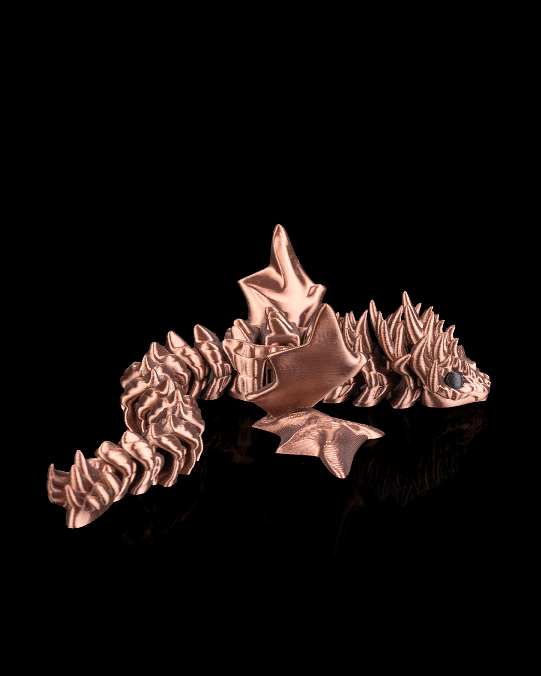 Side view of articulated Flexi Amphiptere displaying serpentine body and wing details.