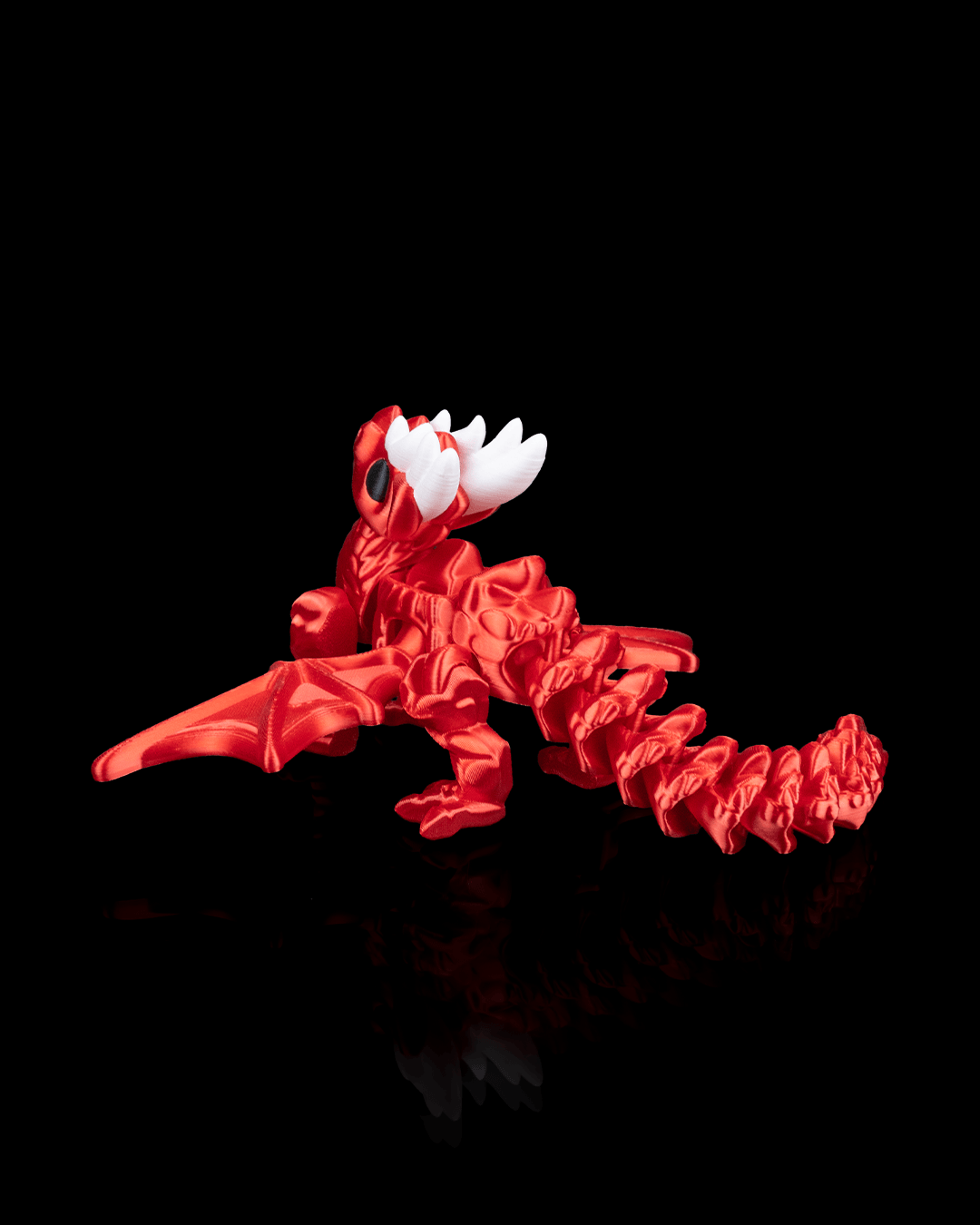 Angled Side view of the Flexi Dragon Legend highlighting its flexible segments and sculpted dragon features.