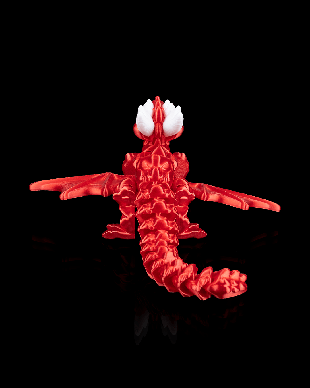Rear view of the Flexi Dragon Legend highlighting its flexible segments and sculpted dragon features."