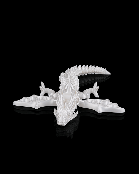 3D printed Flexi Undead Wyvern dragon skeleton in white, front view, showing detailed poseable bones.