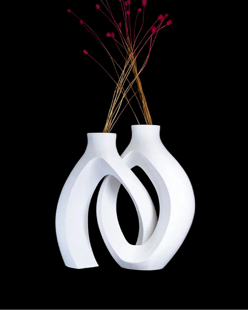 Modern sculptural 3D printed PETG vase with flowing loop design