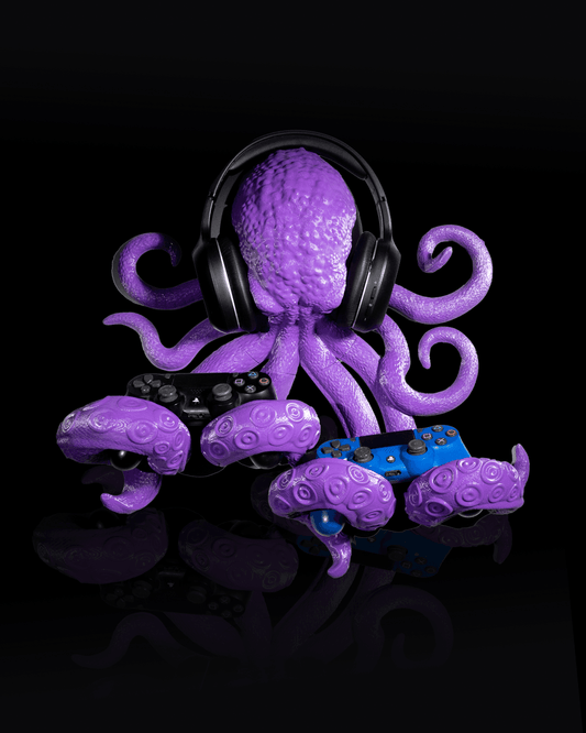 Purple 3D printed Octopus Wall-Mount Holder with headphones and two gaming controllers attached.