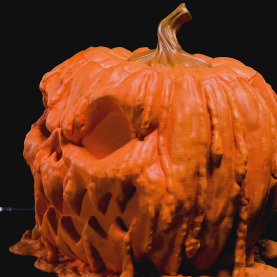 Video of 3D printed Halloween pumpkin candy bowl with creepy melting design, made in Lubbock, TX