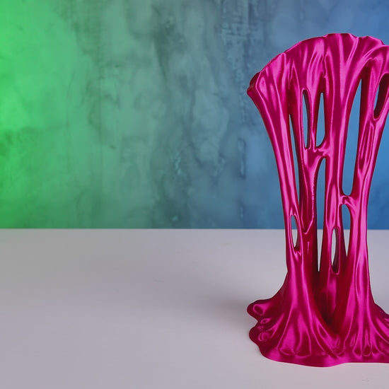 Video of 3D printed headphone holder shaped like melting slime or chewing gum - Lubbock TX
