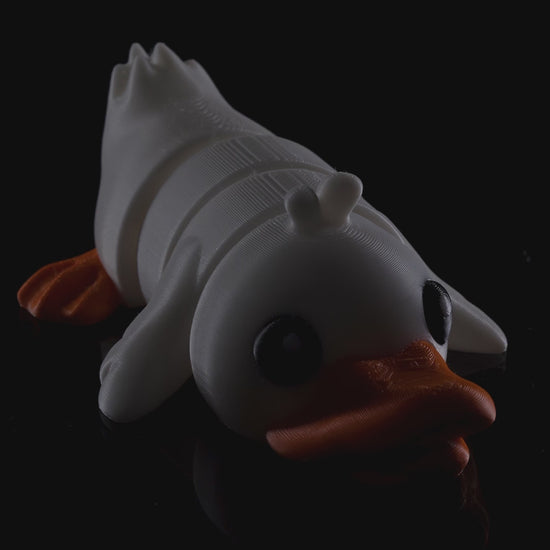 Rotating product video of the 3D printed Cute Flexi Duck showing articulation, color, and movement.