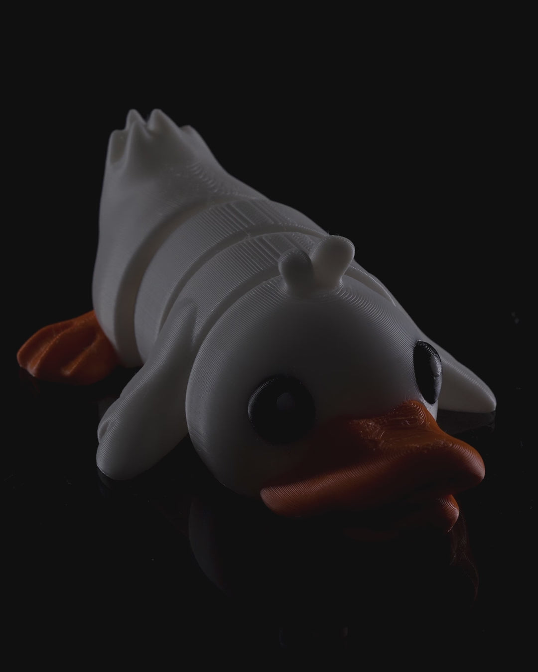 Rotating product video of the 3D printed Cute Flexi Duck showing articulation, color, and movement.