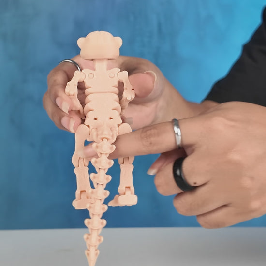 360-degree rotating view of articulated Skeleton Fidget Meerkat toy in beige PLA.