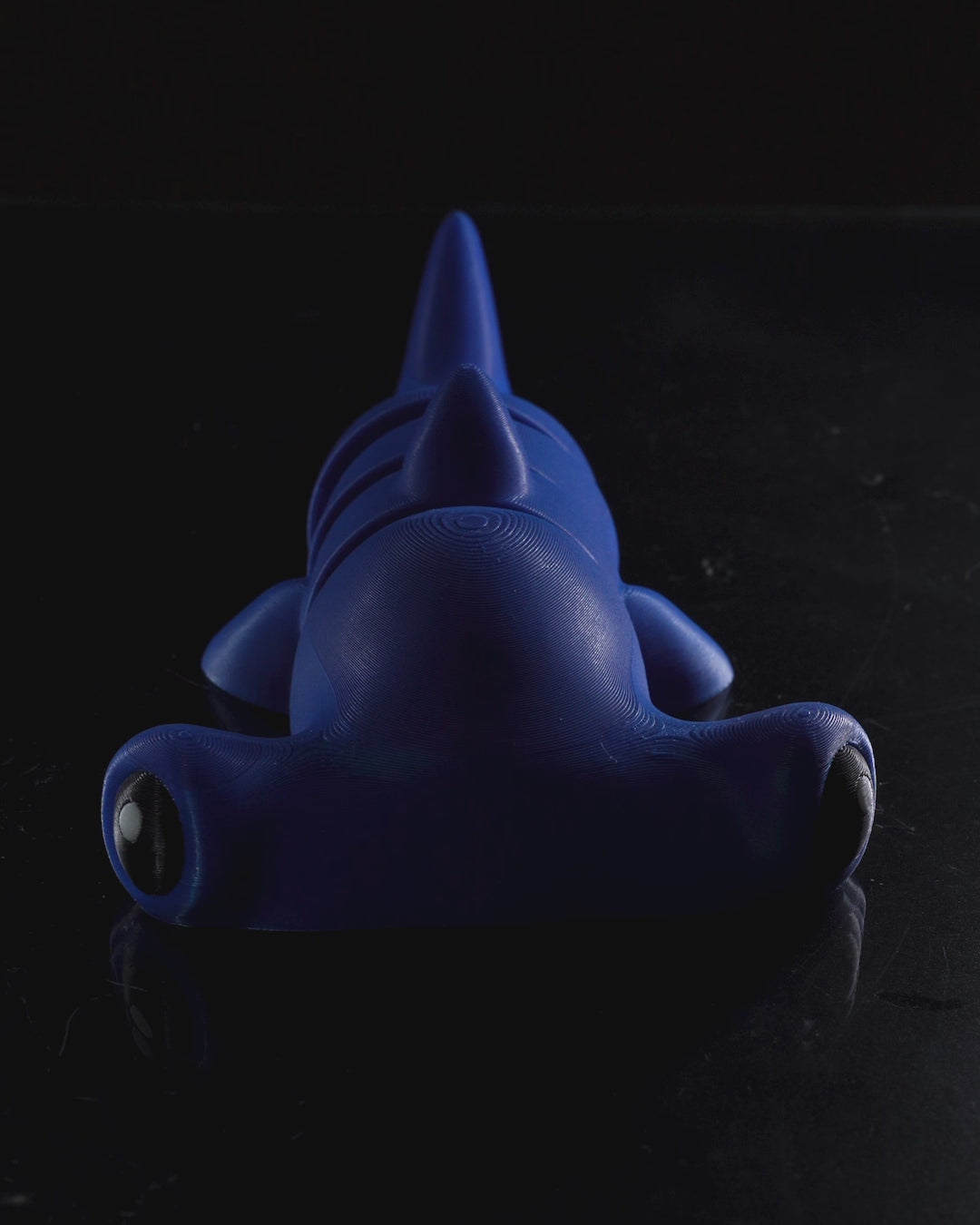 Demonstration video showing the movement and articulation of the flexi hammerhead shark in keychain, magnet, and toy sizes.