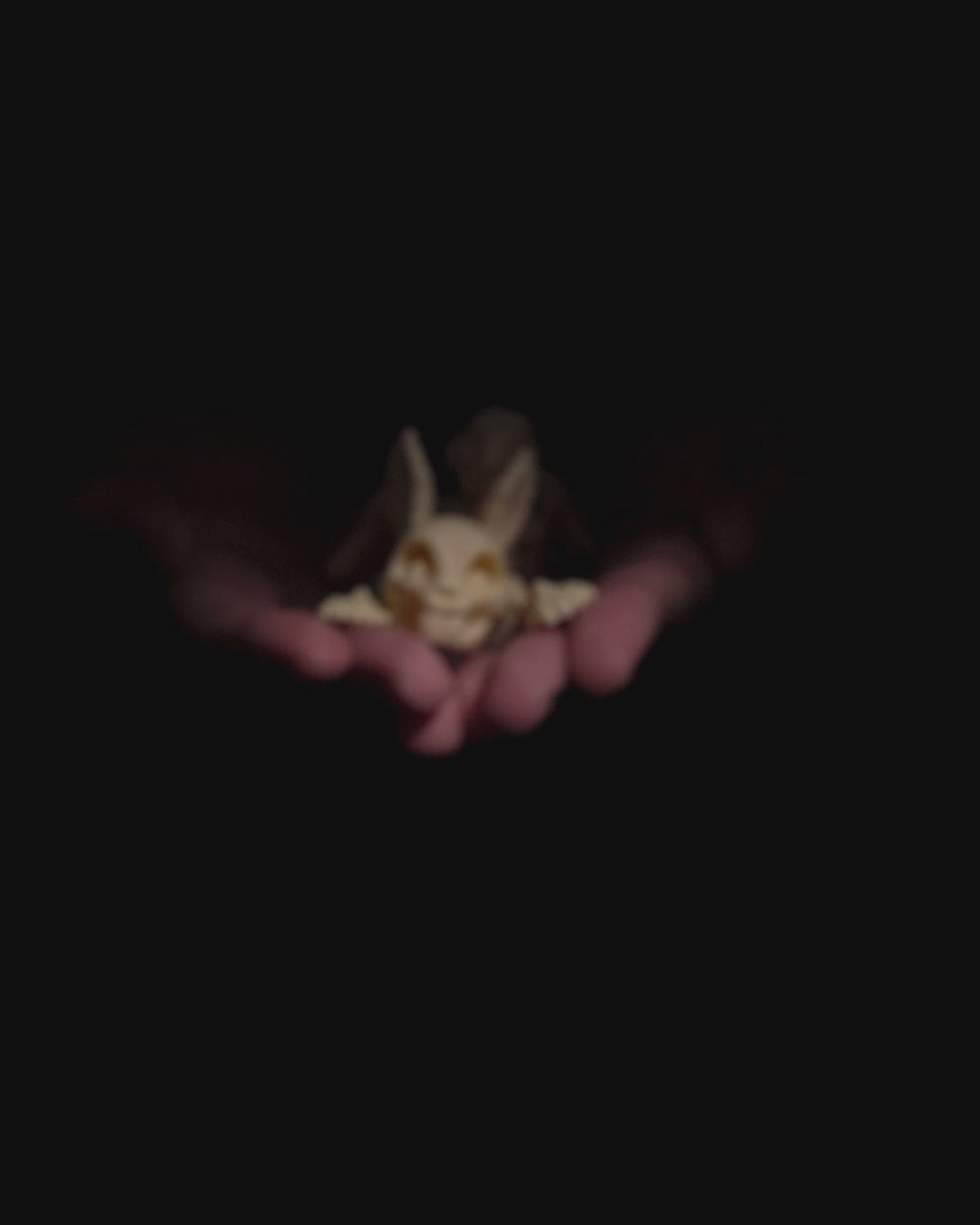 360-degree rotation video of articulated Skeleton Fidget Bunny showing posable ears and skeletal structure.