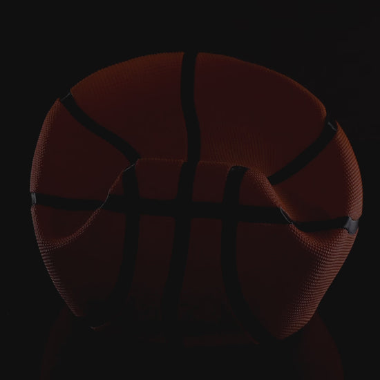 Deflated basketball controller stand in multicolor orange and black video showing multiple angles.