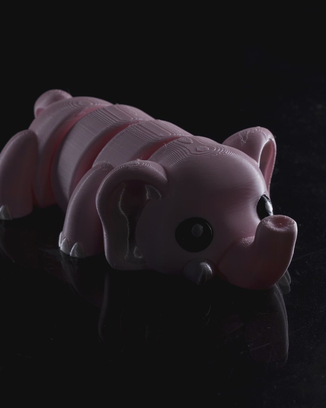 Video demonstrating the bending and movement of the 3D printed Cute Flexi Elephant in toy, keychain, and magnet versions.