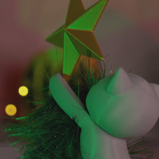 Rotating video of Meowy Christmas Tree Topper showing the 3D printed cat climbing and reaching for the star from all angles.