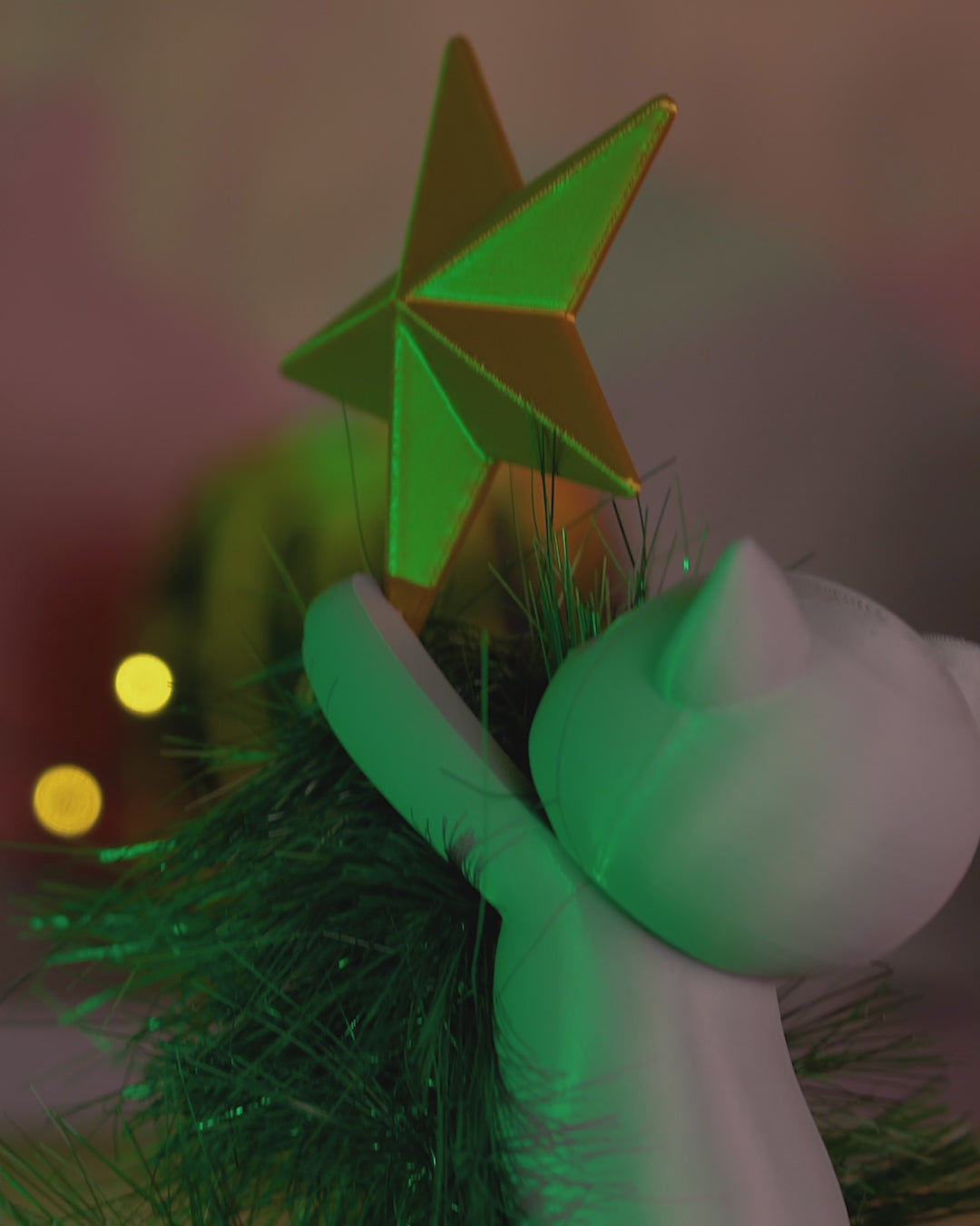 Rotating video of Meowy Christmas Tree Topper showing the 3D printed cat climbing and reaching for the star from all angles.