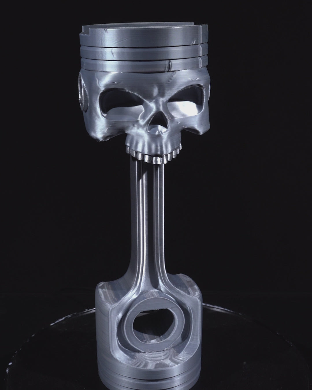 360-degree rotating view of Piston Skull Headphone Holder, a 28cm tall 3D printed headset stand.