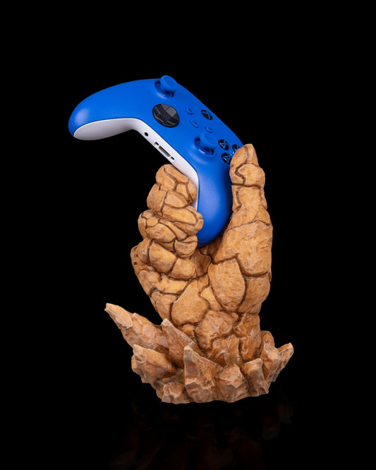 3D-printed Rock Solid controller holder in brown stone texture