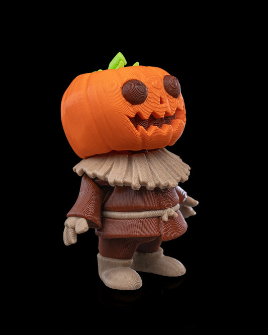 Angled view of the 3D-printed Scarecutie Scarecrow figurine with pumpkin head and textured clothing.