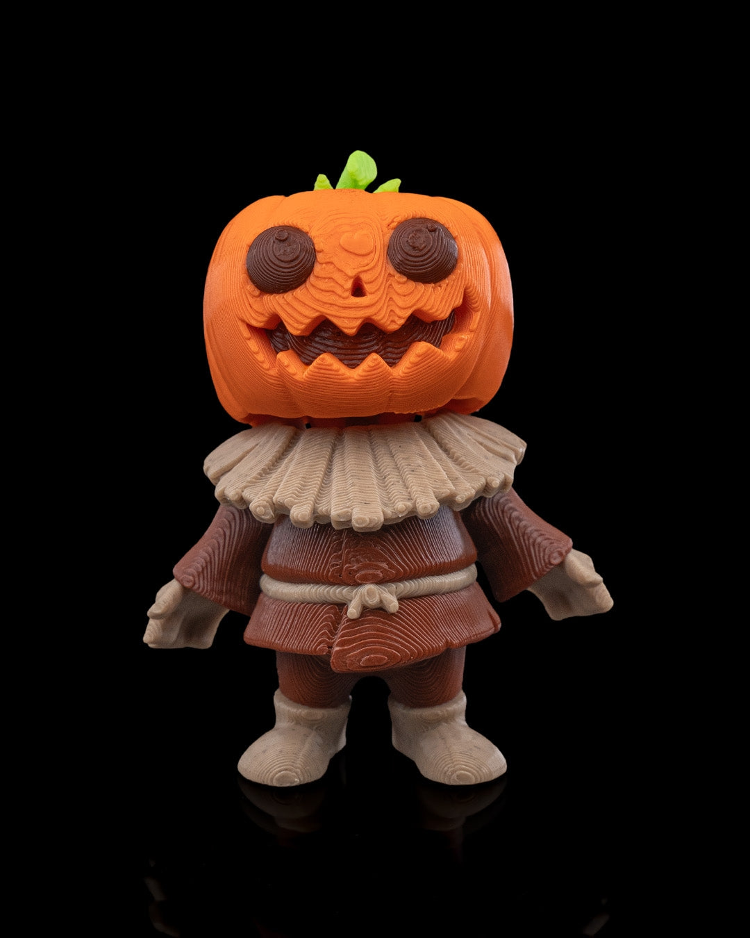 Front view of the 3D-printed Scarecutie Scarecrow figurine with pumpkin head and textured clothing.