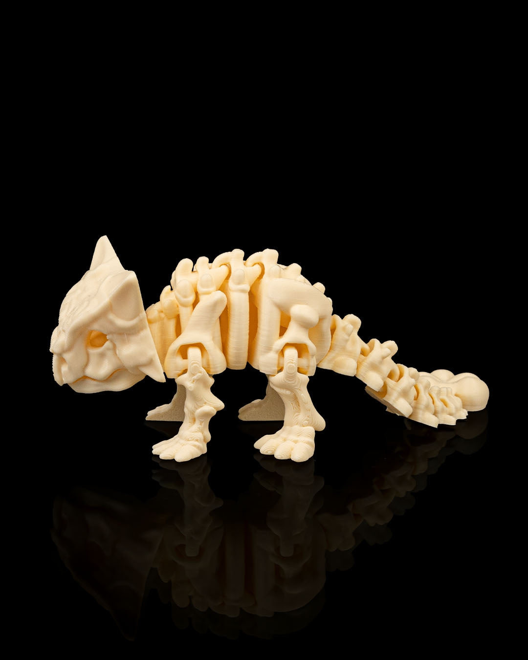 Side profile of 3D printed Skeleton Ankylosaurus highlighting detailed bone structure and tail.