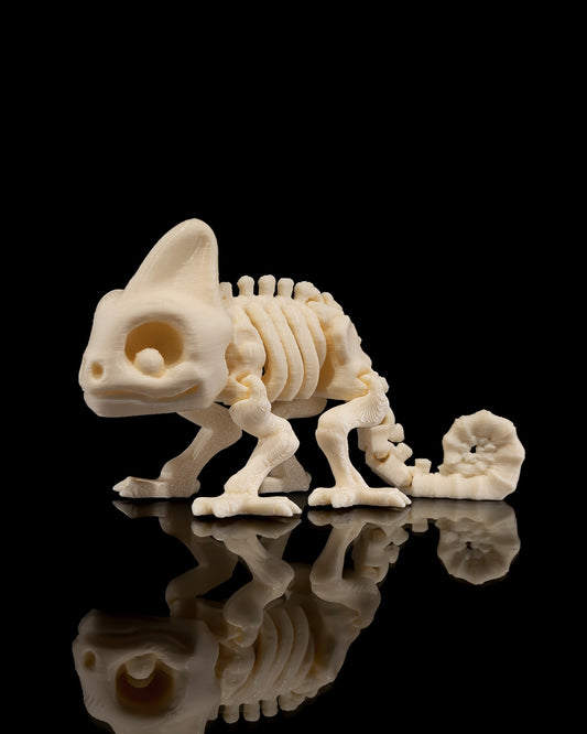 Front angled view of 3D printed Skeleton Fidget Chameleon with curled tail and articulated limbs.
