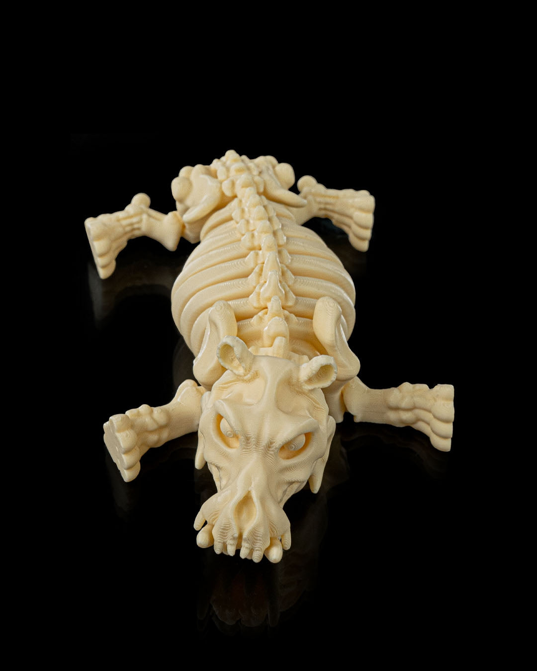 Flat view of Skeleton Fidget Hippo 3D print in beige PLA showing detailed ribs and limbs