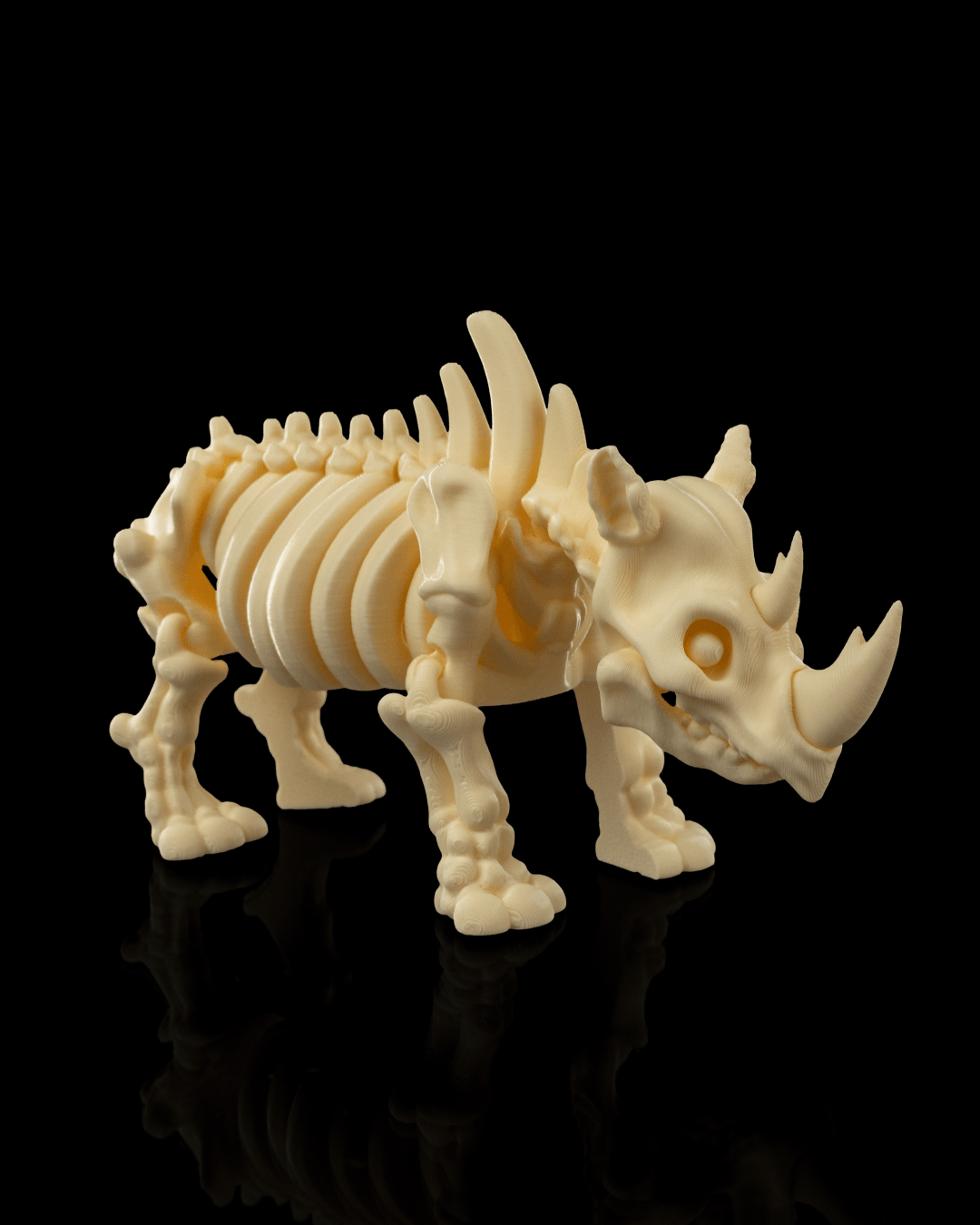 Side profile of Skeleton Fidget Rhino 3D print showing articulated joints and horn details.