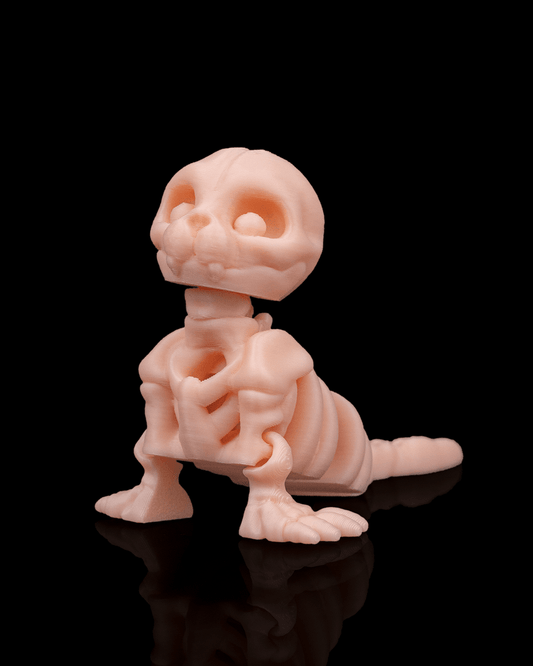 3D printed Skeleton Fidget Seal toy in beige PLA, 5cm tall.