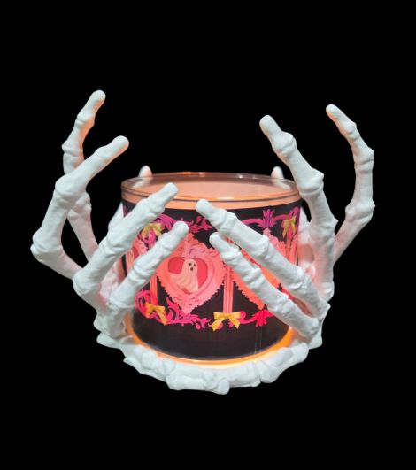 Gothic skeleton hand candle holder, perfect for Halloween décor or altar lighting