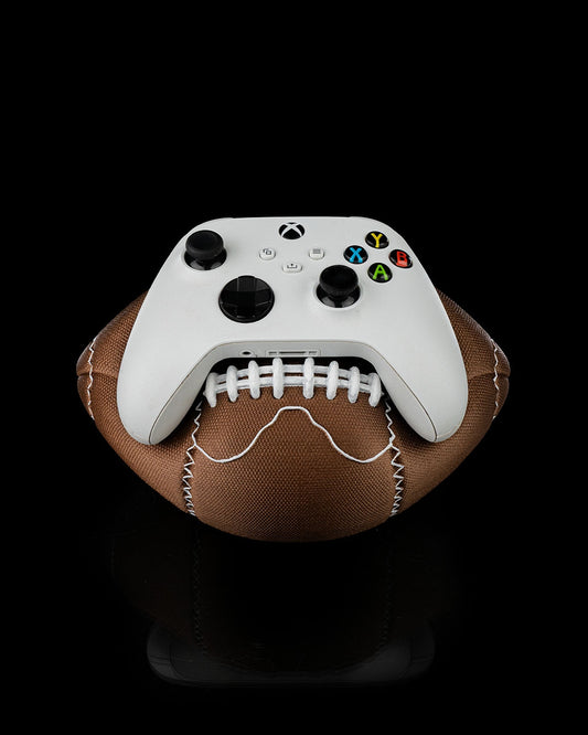 3D-printed football controller holder with Xbox controller resting on top